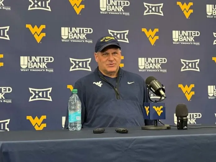 Quarterback competition continues at West Virginia (Photo: Rich Rodriguez - WV Sports)