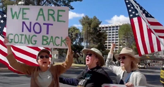 Women’s Day rally unites voices for women’s rights (Photo: KGUN9/YouTube)