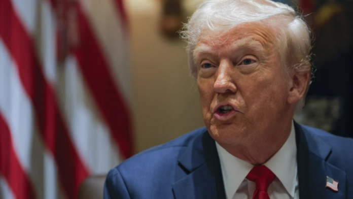 President Donald Trump speaks during a Cabinet meeting at the White House in Washington, Wednesday, Feb. 26, 2025. (Pool via AP)