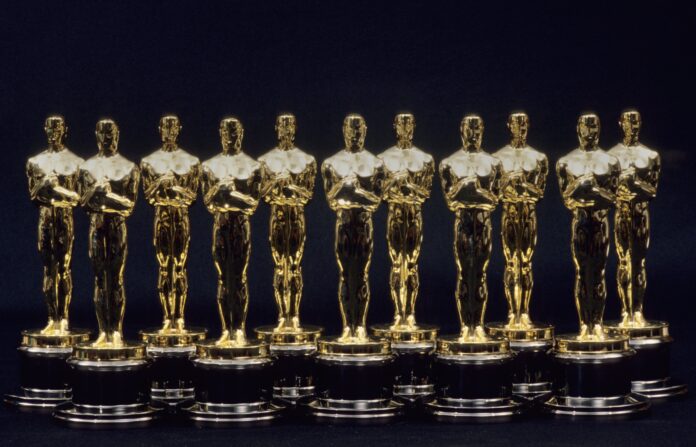 LOS ANGELES: A view of 11 Oscars statues lined up next to each other in 1990 in Los Angeles, California. (Photo by Santi Visalli/Getty Images)