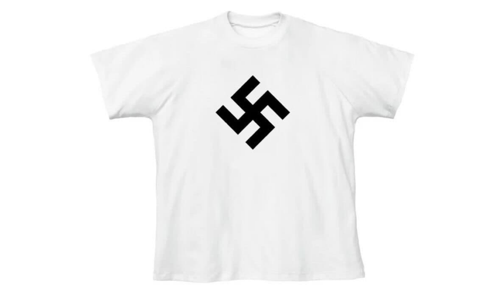 A white T-shirt with a swastika is being sold by rapper Kanye West, now known as Ye, February 2025. Source: Screenshot/Yeezy.com.