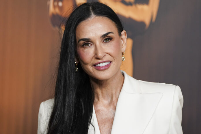 Demi Moore arrives at the Oscars Nominees Dinner on Tuesday, Feb. 25, 2025, at the Academy Museum of Motion Pictures in Los Angeles. (Photo by Jordan Strauss/Invision/AP)